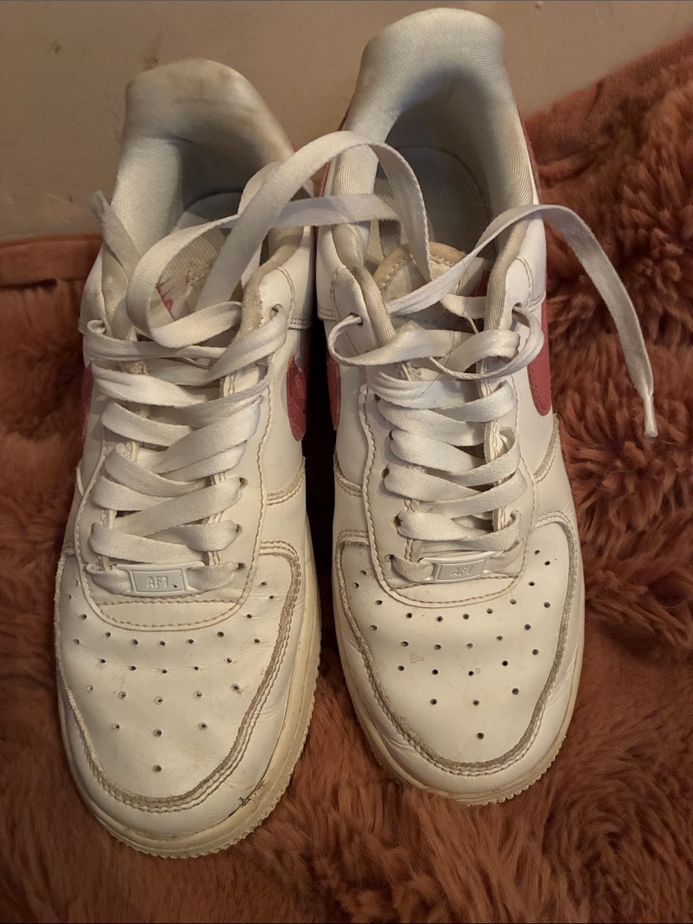 Nike Women’s White and Pink Low-Top Sneakers — Classic Swoosh Style